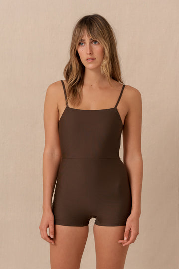 Hakea brown Terrain One Piece shorty surf suit — sustainable swimwear designed for support and comfort in the surf, flattering one piece surf suit for active women.